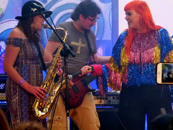 Stage invasion by the Electric Octopus sax player.